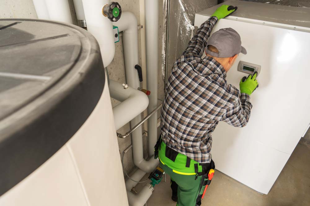 HVAC Technician Checking Residential heating system Colorado Springs, CO