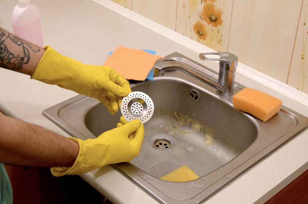 Cleaning kitchen sink plumber in Colorado Springs, CO